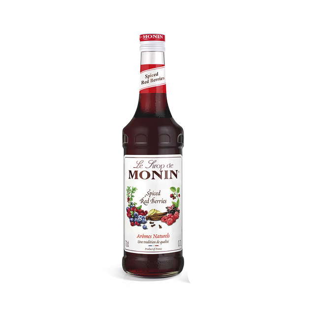 monin spiced red berry syrup bottle and drink