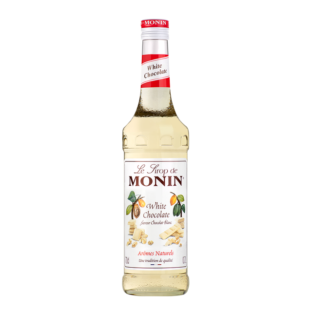 Monin White Chocolate Syrup bottle and a creamy drink